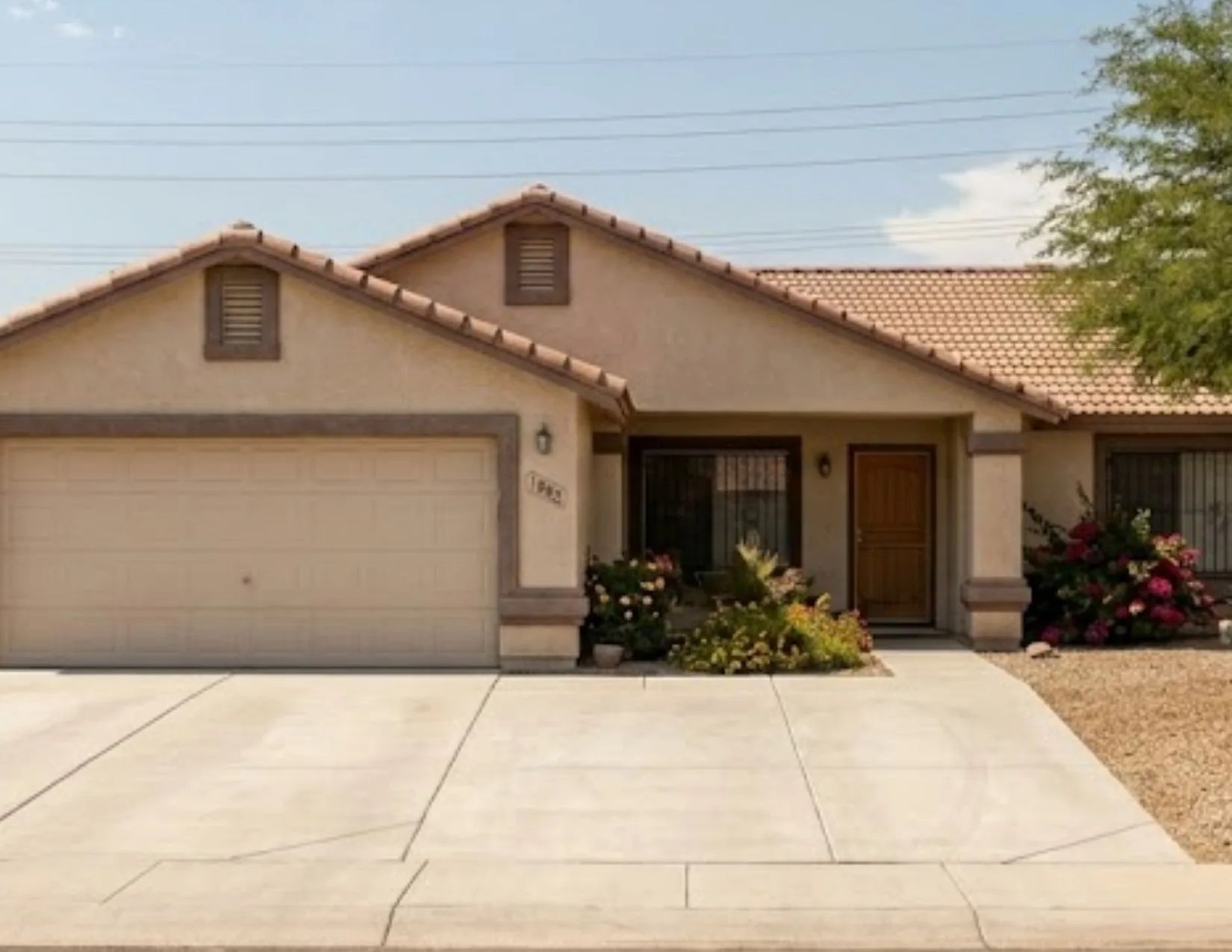 Same Yuma home after Brennan's power washing — same day